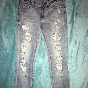 Light wash distressed skinny jeans
